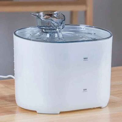 Fontaine a eau chat blanche avec abreuvoir en forme de chat