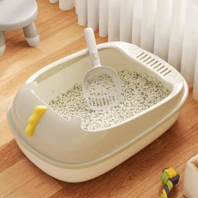 bac à litière chat beige est dans un beau décor et format compact dinobox