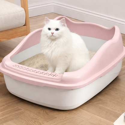 un chat fait ses besoins en toute sécurité dans le bac à litière chat rose cutycat