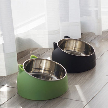 gamelle chat duo vert et noir sur le plancher du salon cutycat